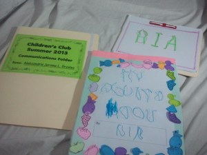 Ria's sign in folder and activity book/collection